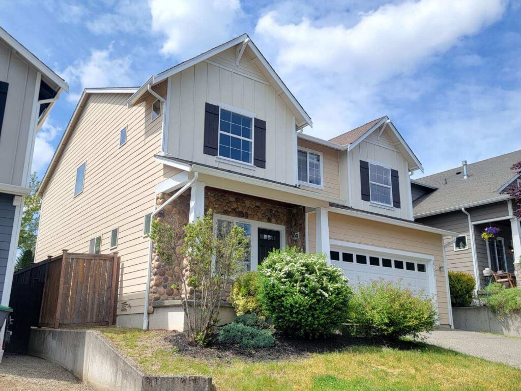 Photo of a house after choosing interior and exterior paints for it.