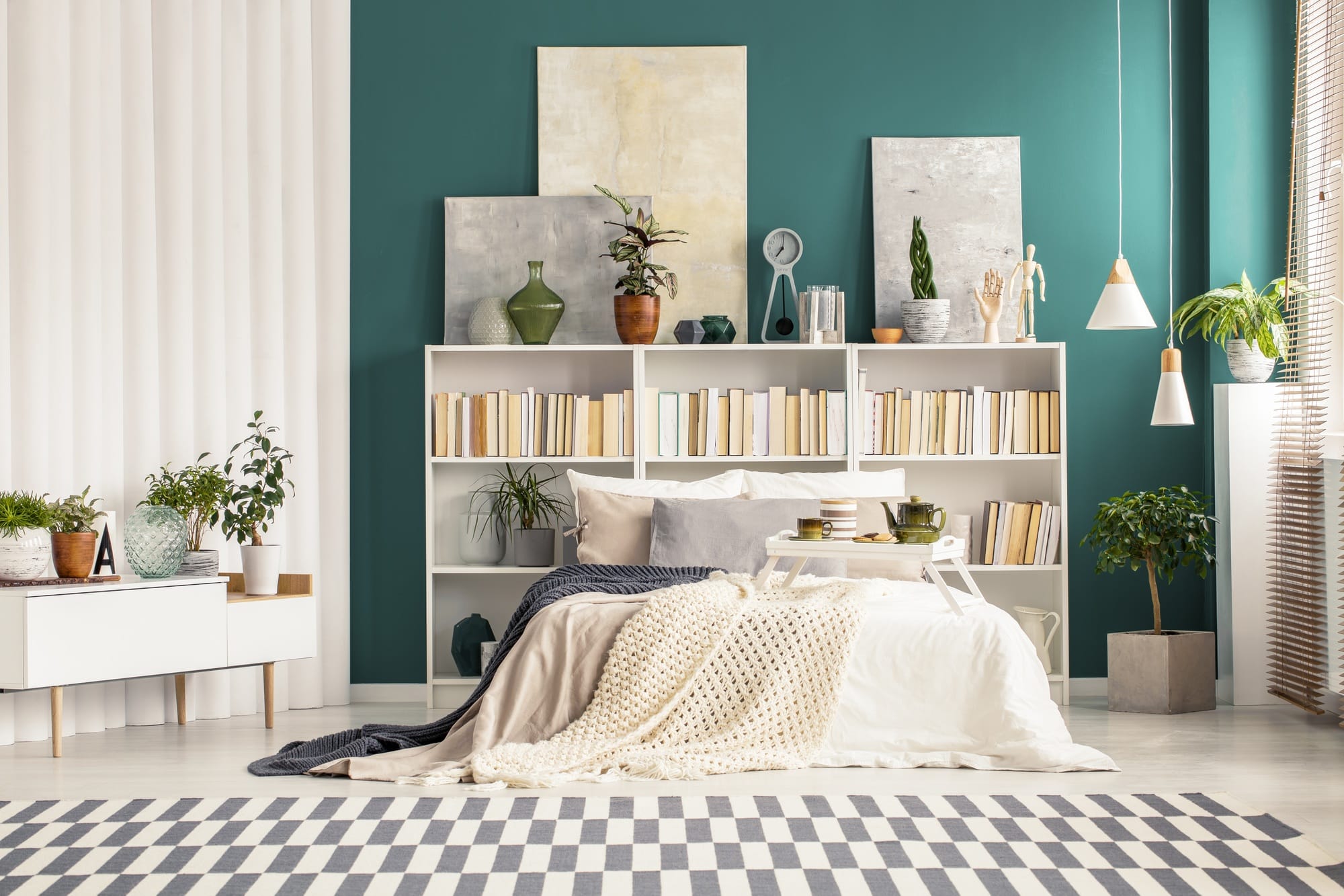 Bedroom interior with paintings